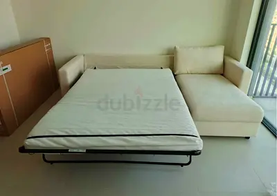 Beige L-shape Sofa bed with Pull-out  Good Condition vimle
