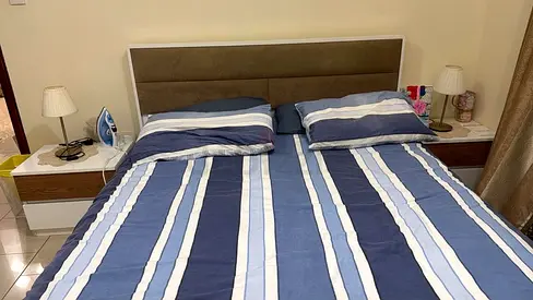 Full bedroom set (Queen bed with headboard, medical mattress, two bedside tables, and dresser)