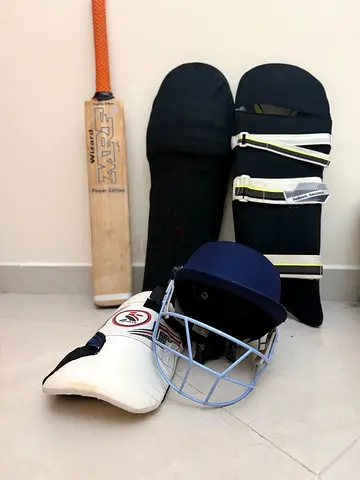 cricket bat pad and helmet