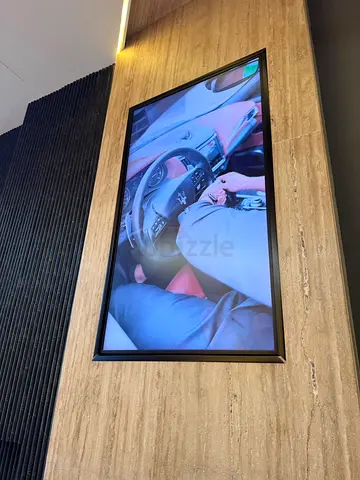 Used 55-inch Vertical Flat Panel TV - Wall-Mounted Display