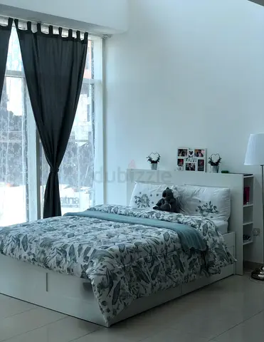 White storage bed with headboard shelves and drawers including mattress - good condition