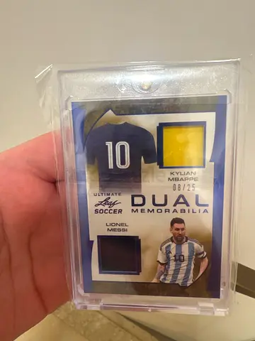 Mbappe and Messi game used dual patch ultimate leaf soccer /25