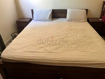 King size wooden bed frame with headboard and two bedside tables