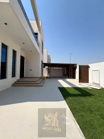 Luxury villa in Al Hoshi, Sharjah, featuring royal finishing, a natural stone facade, 5 master bedr
