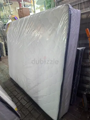 Queen size mattress - new, wrapped in plastic