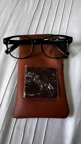 Black prescription eyeglasses with brown leather case - gently used