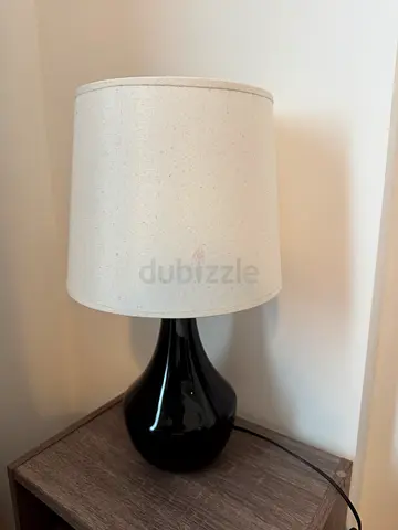 Black ceramic table lamp with white fabric shade