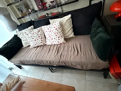 Metal sofa couch with mattress that opens as bed  (good condition)