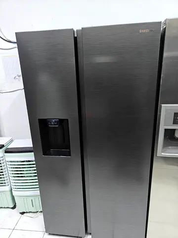 Samsung brand side by side fridge freezer with water dispenser and ice maker