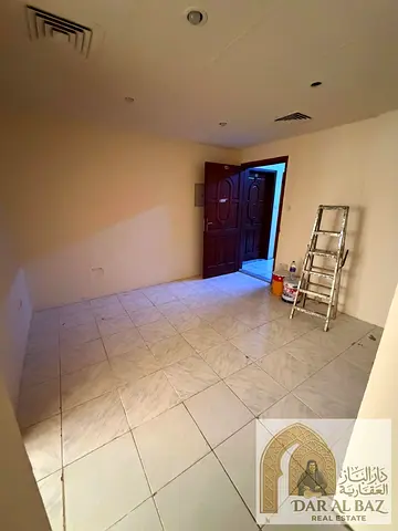 2 Bedrooms + Living Room for Annual Rent in Al Butina, Sharjah | Very Reasonable Price | Central A/C | 1 Bathroom | Flexible Payment Plan | Security D