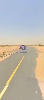 Residential land for sale in Sharjah | Tilal City (Corner plot – two streets + facing a 24-meter w