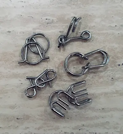 Set of 5 Metal Brain Teaser Puzzle Toys - Assorted Wire Puzzles