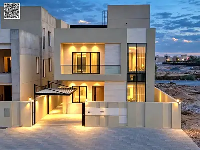 Villa for sale on Sheikh Mohammed Bin Zayed Road, located on a main street near the park. It features two floors and a rooftop terrace. Freehold owner