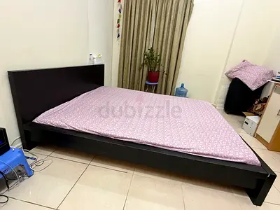 IKEA 180x200 king size bed frame with bed .AED 200 . Contact 0503627144