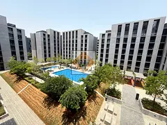 Luxury Fully Designed Corner Studio | Balcony | Pool View | Premium Amenities | Tiraz, Aljada