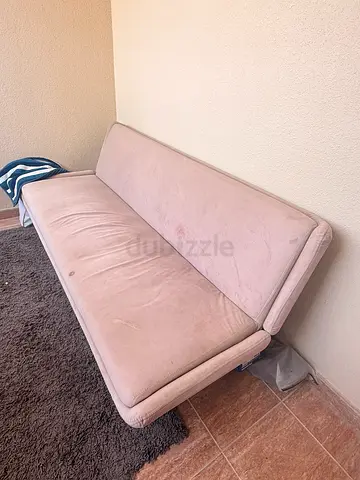 Three-seater pale pink sofa/sofa bed - used