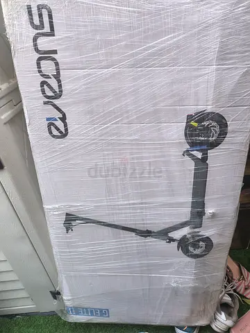 Almost-new electric scooter in box - single rider urban scooter