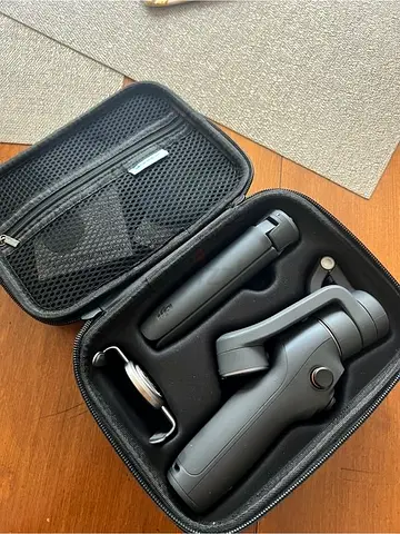 DJI Osmo Mobile handheld smartphone gimbal with case