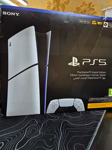 Ps5 slim digital edition with controller Marvel's Spider-M and charging station and box included
