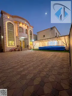 Villa for annual rent in Al Rawda 3, Ajman – features a large courtyard, an external majlis, and a
