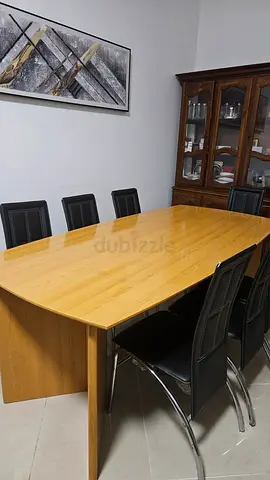 Light wood dining table with 6 black chairs - good condition