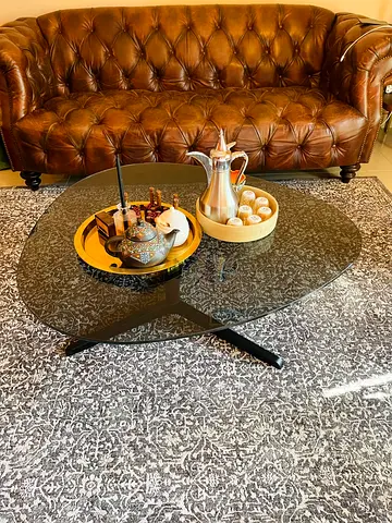 Glass Coffee Table with Modern Black Base — Good Condition