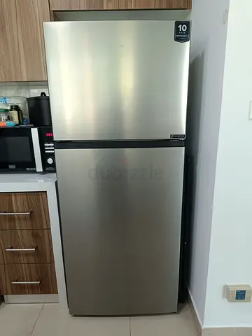 Stainless Steel Top Freezer Refrigerator - Great Condition (only 9 months of usage)