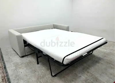 Light beige fabric sofa bed with mattress  good condition