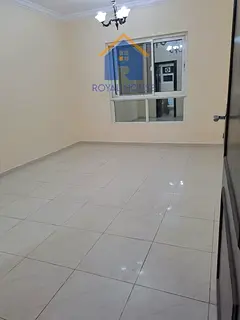 Apartment with one bedroom and a living room for rent in Al Qasba.
