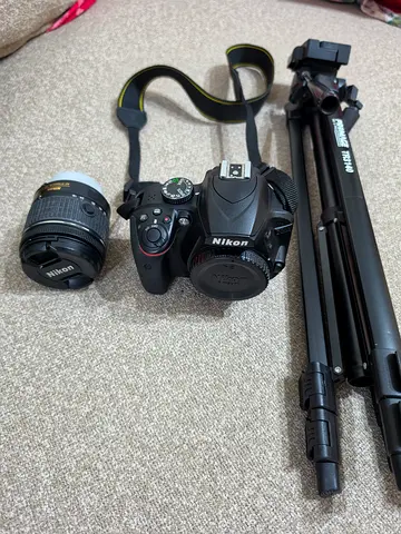 Nikon D3400 DSLR Camera with Lens, Tripod and Bag