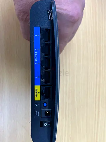 LINKSYS E1200.  4-port Ethernet Router with WAN Port and 12V Power
