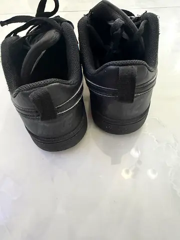 Pair of black Nike sneakers, lightly used, size EU 38