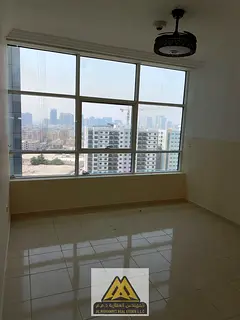 2BR in Orient Towers, Block B, Ajman. Master bedroom, 2 baths, balcony, with stunning creek and city