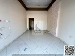 Spacious shop with a private office in Al Jurf 3, ready for your business