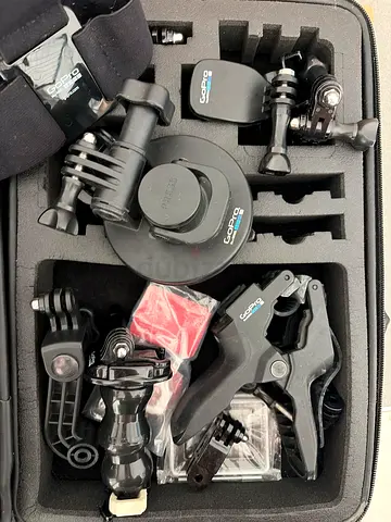 GoPro accessory kit with mounts, suction cup and clamps in hard case