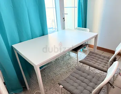 White rectangular dining/office table with metal frame with 4 chair