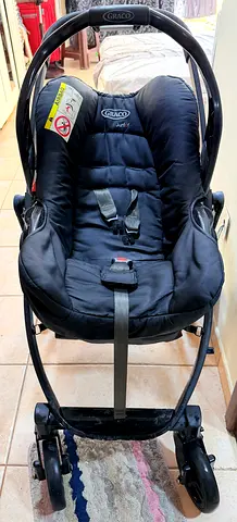 Graco stroller with car seat Frame - Good Used Condition