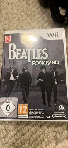 Rock band guitar with 2 wii rock band games