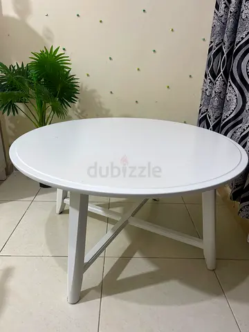Round white wooden side table - simple design