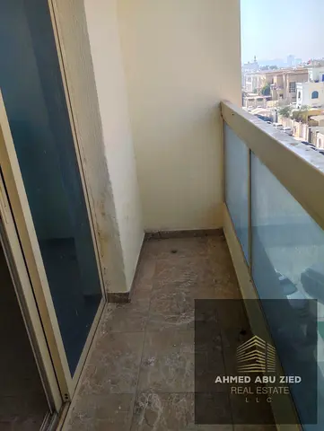 One-bedroom apartment for annual rent in Al Rawda 1, Ajman. Balcony, 2 bathrooms, spacious layout,