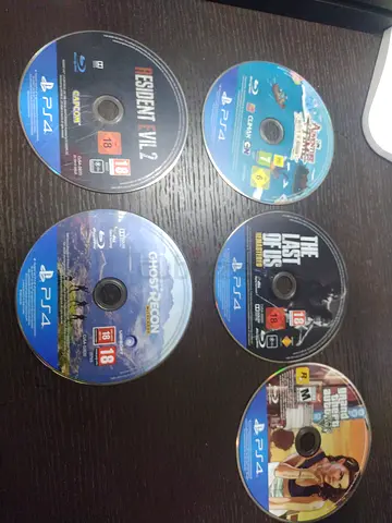 Bundle of 6 PS4 game discs - Last of Us, GTA V, Resident Evil 2, Ghost Recon, Uncharted & more