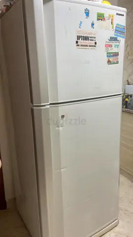 Used top-freezer fridge - good working condition براد للبيع