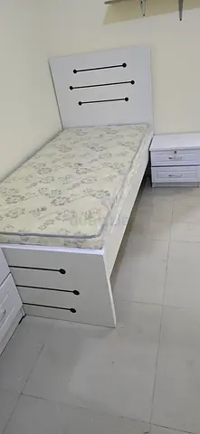 New Single white wooden bed frame with mattress and matching bedside drawer