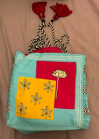 Colorful drawstring cloth backpack with tassels