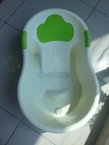 Used white and green baby bathtub - good condition
