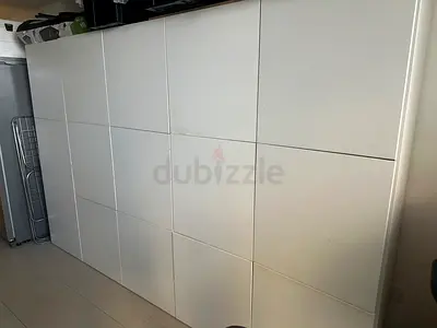 5 unit white wardrobe / storage cabinet - with white internal storage boxes. Not contents