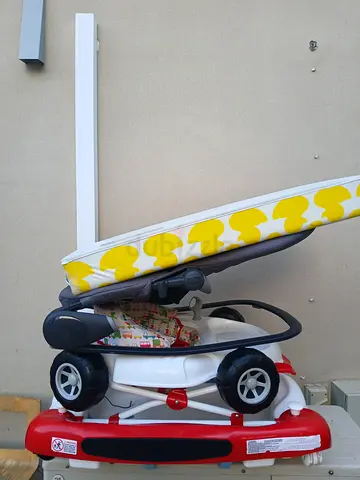 Foldable baby stroller with matching sun canopy - good condition