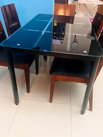 Glass Top Dining Table with 4 Wooden Chairs - Good Condition