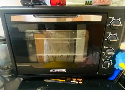 Toaster Oven with Double Grill, 2000W, 55L Capacity in mint condition very less used.