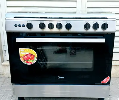 Midea gas cooker with all 5 burners and oven are good working condition. Size 90x60cm.